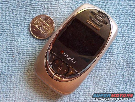 Siemens Cingular cell phone with a quarter on a blue towel