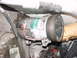 1998 Volkswagen Jetta - Close-up of an air conditioning compressor, identified by the "ZYLINDER SD7V16" label.