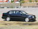 1994 Volkswagen Jetta - This black 1994 Volkswagen Jetta sedan is shown from the side, aftermarket wheels and a lowered stance.