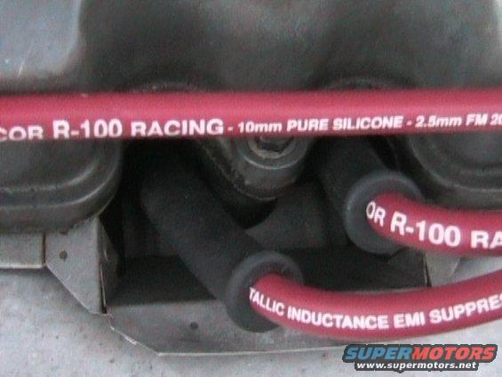 Red spark plug wires labeled R-100 Racing
