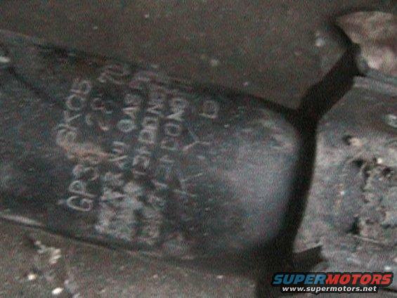 Part with stamped text including 'GP304 SK05' and '23.8 GAU GAS'