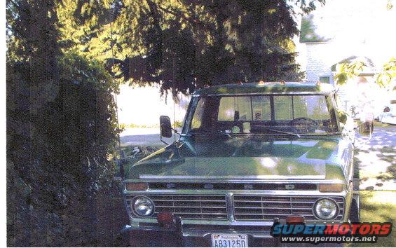 1973 Ford F-250 pickup truck parked in a driveway, front view