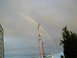 1979 Ford Bronco - A double rainbow appears in the sky after a storm, with a telephone pole and wires in the foreground.