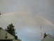 1979 Ford Bronco - A rainbow appears in the sky above houses and a utility pole.