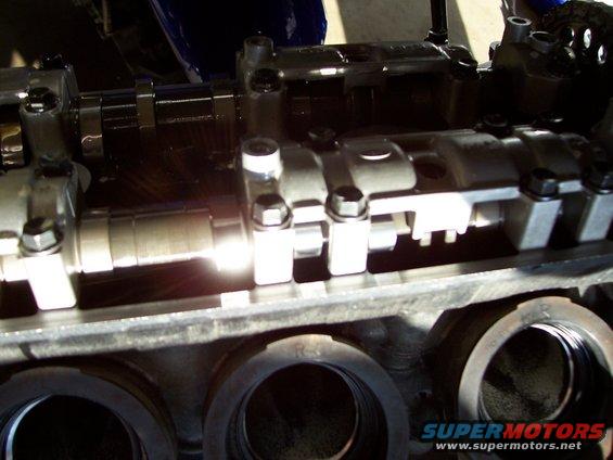 Close-up of engine valve train with camshaft and rockers