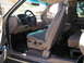 1999 Ford F-150 - Interior view of a 1999 Ford F-150, showing the dashboard, seats, and door panel.