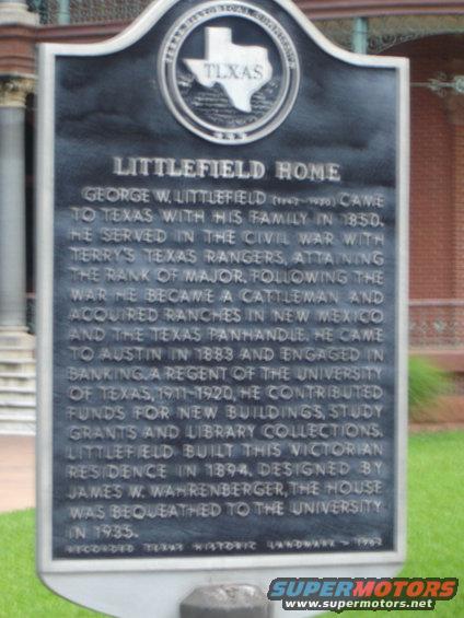 Black historic marker with Texas seal and text about Littlefield Home