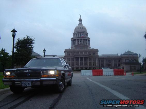 1988 Ford Crown Victoria parked in front of a capitol building
