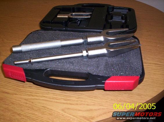 Tie rod end removal tool set in a black and red case