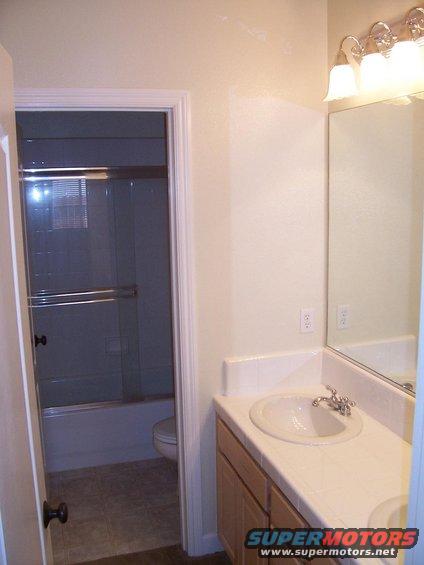 100_3194s.jpg my bathroom, with 2 sinks :), taken from hallway