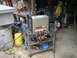 1995 Ford Bronco - A Hypertherm Powermax 800 welding machine is on a multi-tiered cart in a workshop setting.