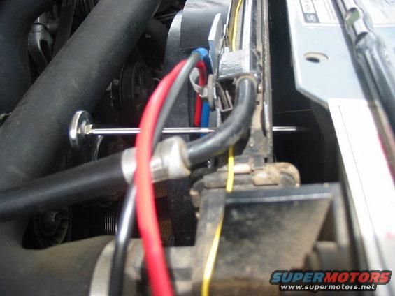 Checking the temp with a fast response meat probe.  Note that the probe has to be sticking about an inch thru the radiator to get a proper reading.
