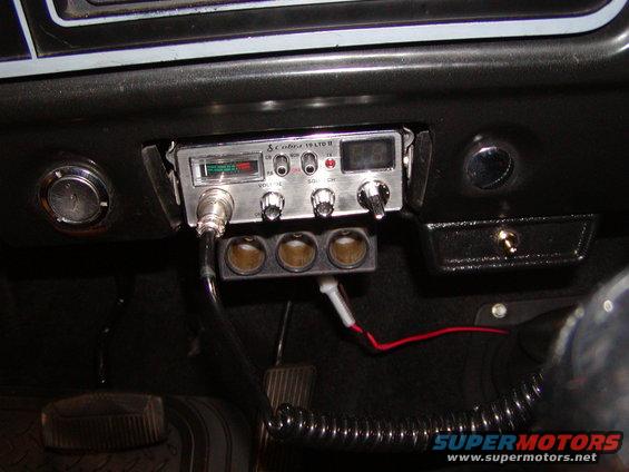 Dashboard with Cobra 19 LTD II CB radio, three power outlets, and a toggle switch