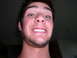 1990 Ford Bronco - A man smiles for the camera in this close-up portrait.