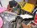 1994 Ford Bronco - A fuel injector is secured in a vise for work, with a toy truck visible in the background.