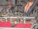 1994 Ford Bronco - Close-up view of engine fuel injectors, with red rags placed below for protection during maintenance.