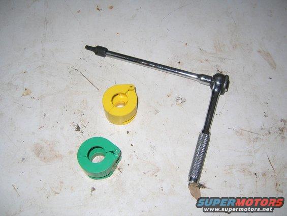 Yellow and green fuel injector removal tools with a ratchet