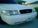 2000 Ford Crown Victoria - New honeycomb grille less Ford emblem at the moment, however painted surround white to match body.