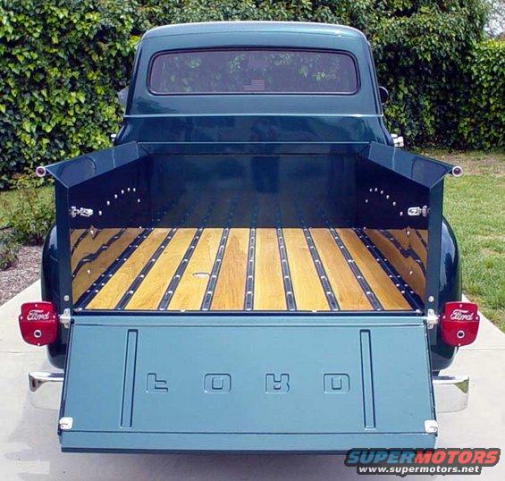 1956 Ford F-100 rear view with tailgate down and wooden bed