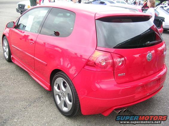 Red Volkswagen GTI rear view with GTI badging
