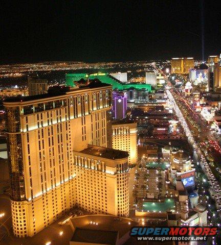 Las Vegas Strip at night with illuminated hotels and traffic