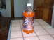 1990 Ford Bronco - A bottle of Shasta Orange soda sits on a tiled countertop.