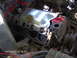 1978 Ford Bronco - Close-up view of an engine block with the intake manifold removed, revealing the cylinder bores and gasket surface. Date stamp indicates 04…
