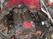 1978 Ford Bronco - Close-up view of an engine block, showing internal components and a red rag.