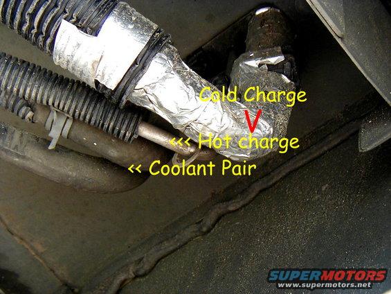 ac-coolant-lines3.jpg Photo of the cold charge line re-insulated prior to entering from under the Auxiliary climate control unit.