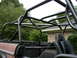 1995 Ford Bronco - Custom roll cage installed on a vehicle, viewed from the rear passenger side.
