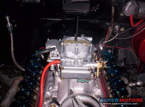Holley carburetor on engine with blue valve covers