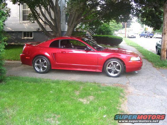 side shot of the car today. Lowered, wheels,exhaust,etc...