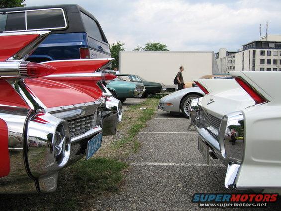 Red 1959 Cadillac Eldorado tail fins and chrome rear view