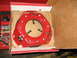1972 Ford Mustang - A red clutch pressure plate is shown inside its packaging, with a toolbox visible to the left.