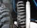 1978 Ford Bronco - A detailed view of off-road suspension components, including a tire and shock absorber.