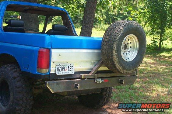 1987 Ford Bronco rear view with spare tire mounted on custom bumper