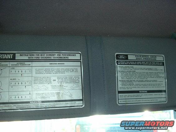 Sun visor with Ford overdrive transmission and four-wheel drive shift procedure stickers