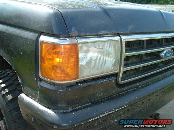 1989 Ford Bronco front corner with amber turn signal and chrome grille