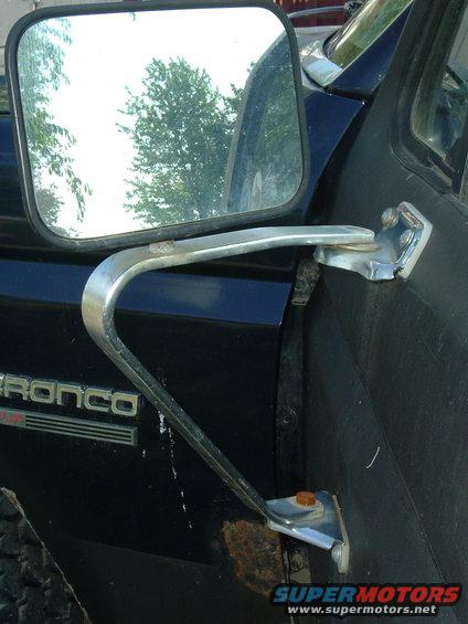 1989 Ford Bronco side mirror mount and door panel with Bronco badging