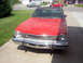 1974 Ford Maverick - Front view of a red 1974 Ford Maverick with a black vinyl top.