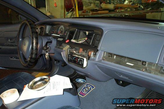panel-removed.jpg The following pictures document the removal of the gauge cluster and installation of the painted trim cover. First, the left and right hand finish panels must be removed. 