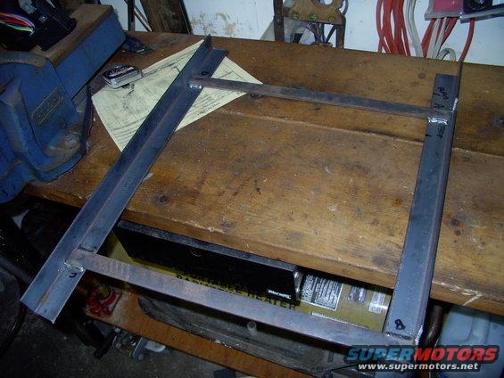 img_0024.jpg Here's the frame partially welded and ready to re-fit the fan and mark and drill some stud holes. 