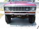 1985 Ford Bronco II - Front view of a 1985 Ford Bronco II, its chrome grille and bumper.