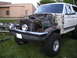 1990 Ford Bronco - next it's the rad supports turn. I left the radiator and condenser connected as well as the tranny cooler. With a little care it can be don…