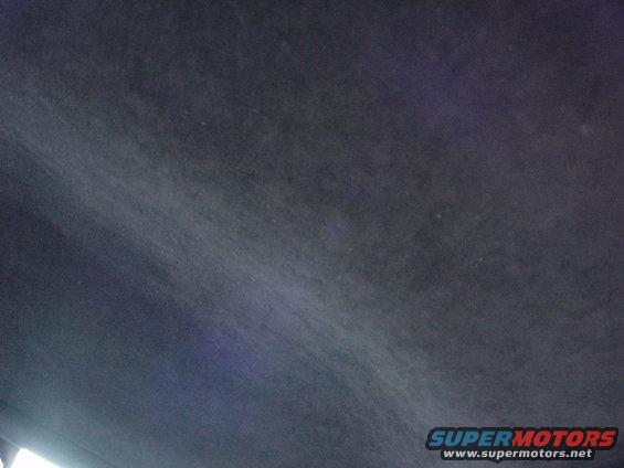 Dark interior headliner with Supermotors logo