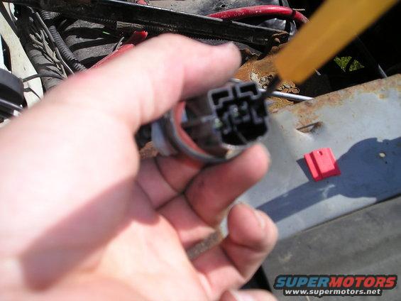 use a tool to release pins