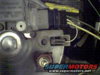 Alternator with yellow warning sticker and Supermotors logo