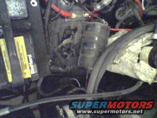 Engine bay detail with DieHard battery and wiring