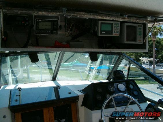 Inside an RV, looking forward past the dashboard and windshield