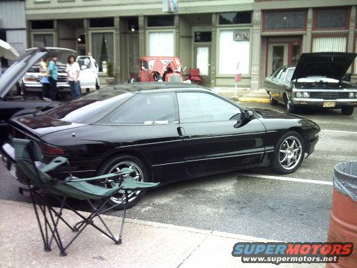 1995 Ford Probe parked on street with another car in background
